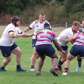 Jackson Clark in possession for Worthing Raiders at Wimbledon | Picture: Colin Coulson