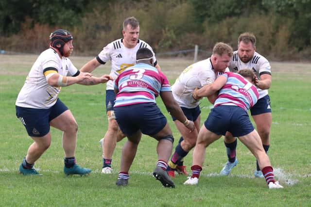 Jackson Clark in possession for Worthing Raiders at Wimbledon | Picture: Colin Coulson