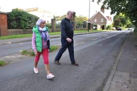 Peter Cavell and Pam Overington Gould are among those campaigning for a pedestrian crossing outside Rustington Hall. Photo: Steve Robards SR2210031