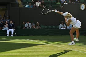 Brighton's Sonay Kartal serves the ball to US player Madison Keys during their women's singles match at Wimbledon  Photo by GLYN KIRK/AFP via Getty Images