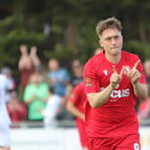 Jake Robinson celebrates one of his two goals against Whitehawk | Picture: Mike Gunn