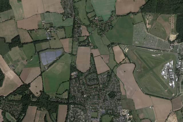 CC/22/01982/FUL: Rawmere, Rew Lane, Chichester. Installation of 26 ground mounted solar panels in adjacent field. (Photo: Google Maps)
