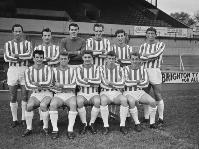 Unspecified Brighton & Hove Albion players pose for a team portrait at the club's home stadium, the Goldstone Ground, in Hove in November 1963. It was a decent season for Albion who finished 8th in Division Four, they would win the league the following season.