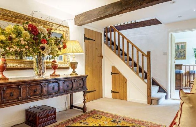 An entrance porch leads into a spacious entrance hall. There is a study or ground floor bedroom to the right hand side with a modern fitted en suite shower room and additional front door.