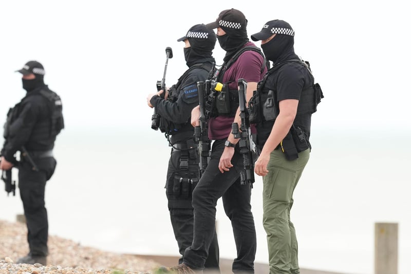 Photos have emerged from Ferring beach showing multiple police officers, carrying firearms.