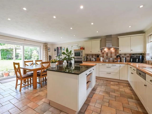 The modern kitchen comes with beautifully integrated appliances.