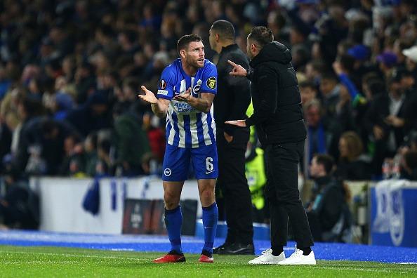 Brighton & Hove Albion's James Milner chats with Manager Roberto De Zerbi