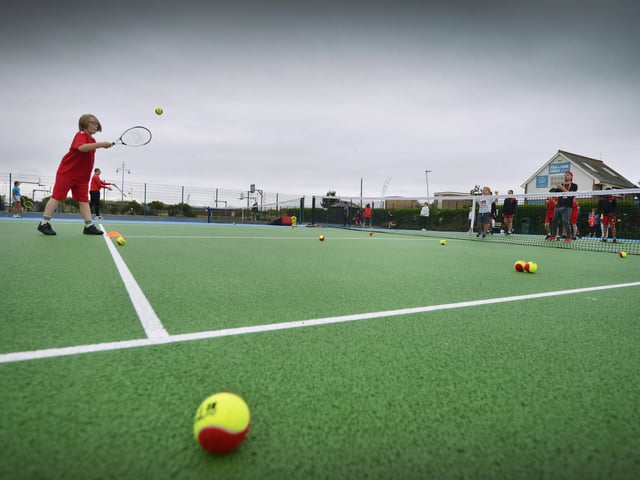Culture Secretary Lucy Frazer marks the refurbishment of 1,000 public tennis courts. Photocall on June 29 at the tennis courts on Royal Parade, Eastbourne, with children from Bourne Primary School and Scott Lloyd, CEO Lawn Tennis Association.
