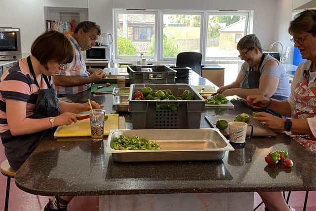 Apuldram Centre volunteers sorting and processing the pepper donation