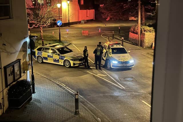 Police officers at the scene of a collision in Angmering High Street