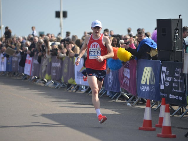 Images from the finish area at the 2026 Hastings Half Marathon
