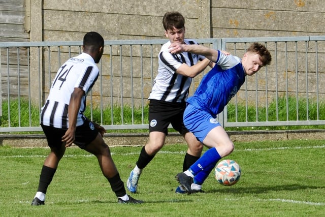Action from Shoreham's draw with Peacehaven and Telscombe at Middle Road