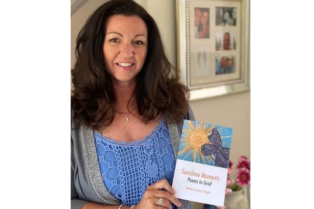 Kerry with her poetry book - Sunshine Moments