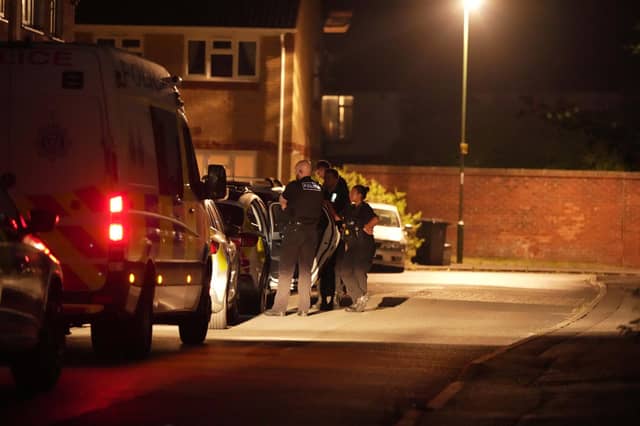 Police at the scene during the night. Picture: Sussex News and Pictures