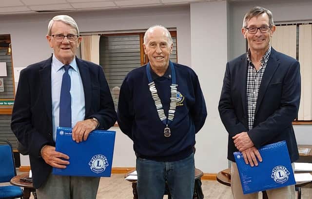 Photograph: President Michael Snell (Centre) after inducting Don Ingram (left) and Gary Newton (Right) into Billingshurst & District Lions Club.