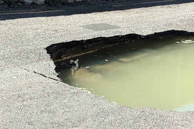 Crouch Lane is currently closed after emergency services responded to reports of a sinkhole appearing. Photo by James MacCleary.