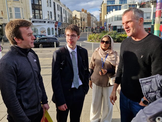 Business secretary Peter Kyle speaking with East Worthing and Shoreham MP Tom Rutland