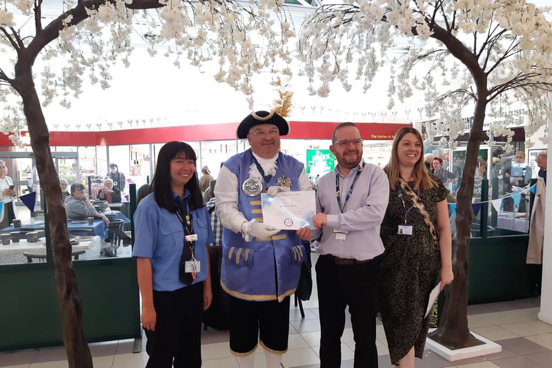 Worthing Dementia Action Alliance presents a certificate to Stagecoach, which provided the transport