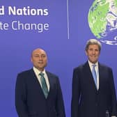 Photo of Andrew Griffith MP attending COP26 alongside former US Secretary of State John Kerry