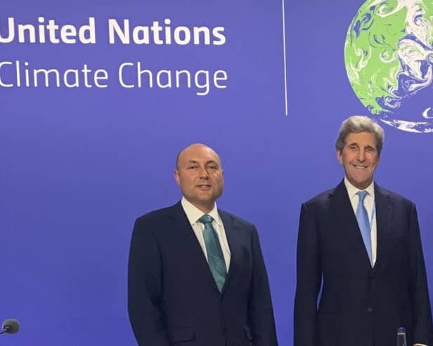 Photo of Andrew Griffith MP attending COP26 alongside former US Secretary of State John Kerry