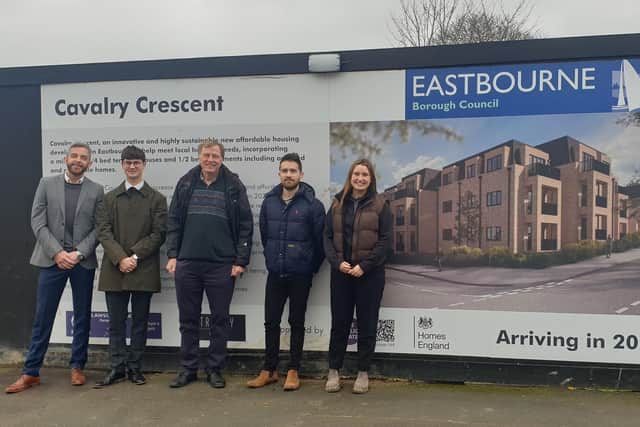 Eastbourne Borough Council's Alan Shuttleworth (centre) with staff from contractor Trinity Homes