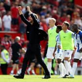 Graham Potter celebrates after the Premier League match between Manchester United and Brighton & Hove Albion at Old Trafford (Photo by Catherine Ivill/Getty Images)