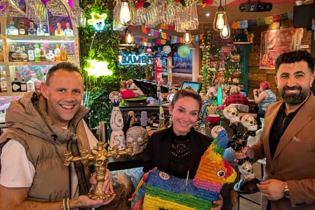 'Day of the Dead' ' celebrations are to be held at La Bamba restaurant in Horsham. Pictured is owner Ercan Yuzey (right) with restaurant manager Pamela Lewry and Horsham Councillor Colin Minto