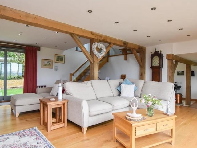 The living area has oak beams