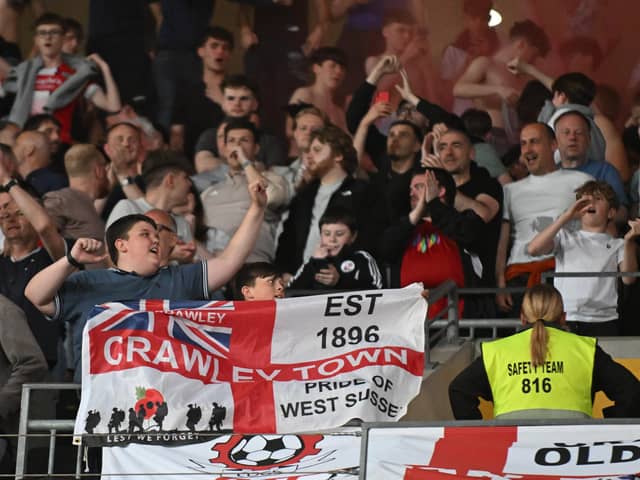 The Crawley Town supporters celebrate during the EFL Sky Bet League 2 play-off second leg match between Milton Keynes Dons and Crawley Town at stadium:mk, Milton Keynes, England on 11 May 2024 | Picture: Dennis Goodwin/ProSportsImages