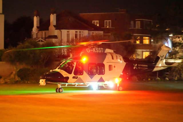 An air ambulance helicopter landed in Marine Gardens, Worthing. Photo: Eddie Mitchell