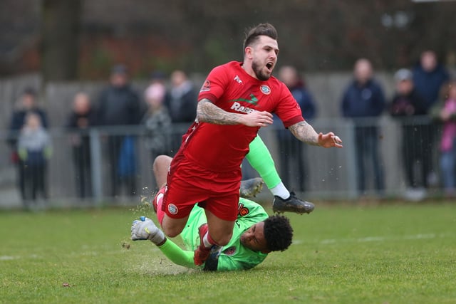 Action from Worthing FC's 0-0 New Year's Day draw art Hampton and Richmond