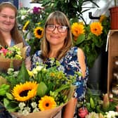 Little Flower Shop owner Emily Kent and colleague Karen Reid celebrate 18 months in business