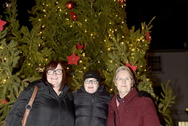 Emsworth Christmas lights were switched on in St Peter's Square on Friday, December 1, 2023. 

Pictured is: (l-r) Tracey Kennett with her son Oscar Silvester and mum Irene Kennett.

Picture: Sarah Standing