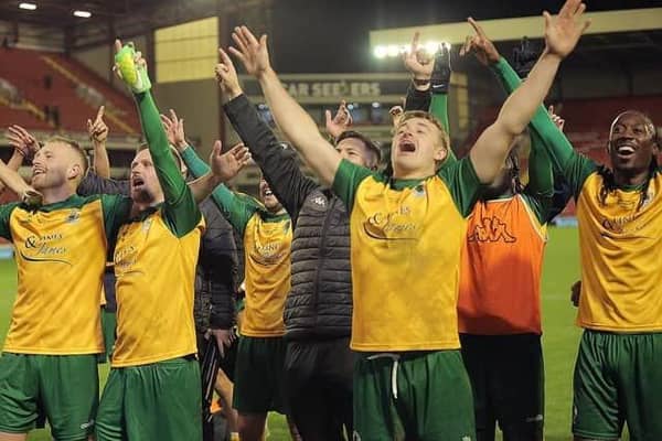 The Horsham players celebrate after holding League One Barnsley in the FA Cup first round. Picture by Natalie Mayhew, ButterflyFootball