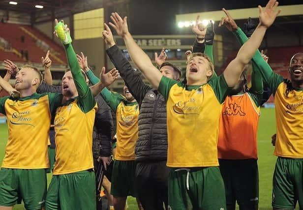 The Horsham players celebrate after holding League One Barnsley in the FA Cup first round. Picture by Natalie Mayhew, ButterflyFootball