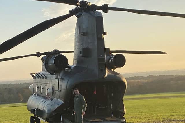 A Royal Air Force Chinook helicopter landed and took off again following an incident on a field north of Arundel, as it conducted a series of flypasts across the South of England for Remembrance Sunday commemorations. Photo: Mark Sheene