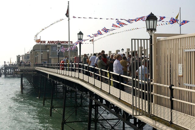 Worthing Pier dressed up and packed solid for the celebrations