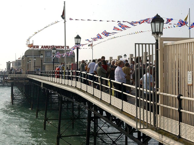 Worthing Pier dressed up and packed solid for the celebrations