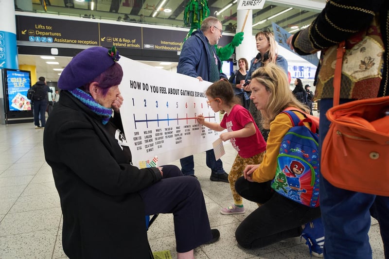 Around 40 Extinction Rebellion activists carried out the poll at Gatwick Airport’s South Terminal, addressing passengers directly about the proposed expansion of Gatwick Airport.