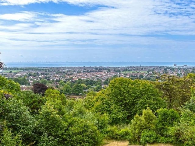 This substantial detached family house sits on the highest point in North Lancing, with grounds totalling 0.5 acres of land. Offers in the region of £1million are invited for this four-bedroom property at the foot of the South Downs National Park, with magnificent panoramic coastal views.
