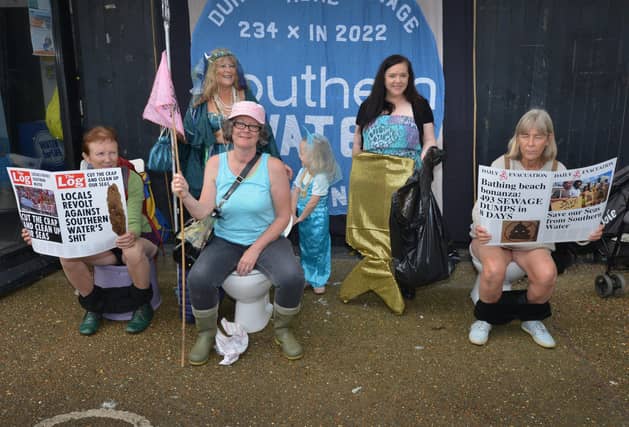 Protest outside Southern Water's Your Water Matters event in Hastings Old Town on October 12 2023.