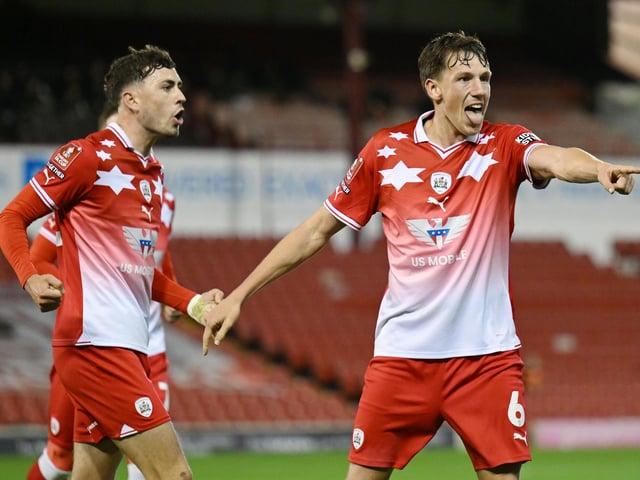 Mael de Gevigney of Barnsley celebrates his goal to make it 3-2 during the Emirates FA Cup First Round match between Barnsley and Horsham at Oakwell Stadium.
