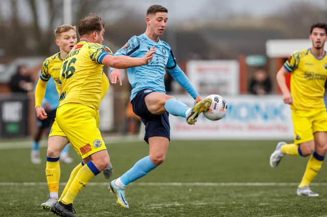 Jake Hutchinson, in light blue, in his last game for Eastbourne Borough - against Havant on New Year's Day | Picture: Lydia Redman