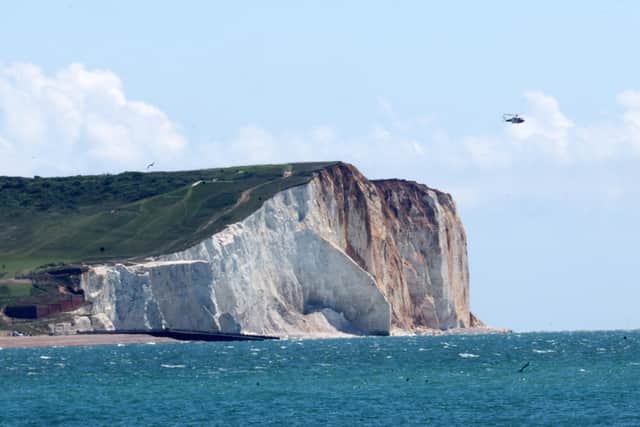 Sussex Police said a man was believed to on board a boat which was taking on water and was unable to get ashore.