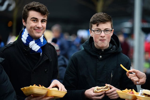 Brighton fans get some food before the Sky Bet Championship match between Milton Keynes Dons and Brighton and Hove Albion at Stadium MK on March 19, 2016.