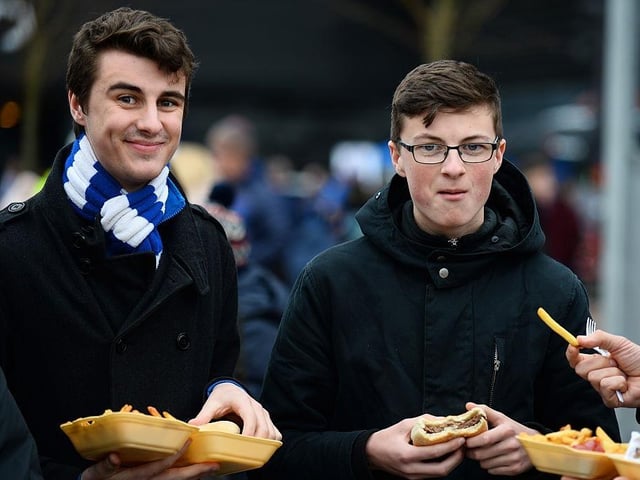 Brighton fans get some food before the Sky Bet Championship match between Milton Keynes Dons and Brighton and Hove Albion at Stadium MK on March 19, 2016.