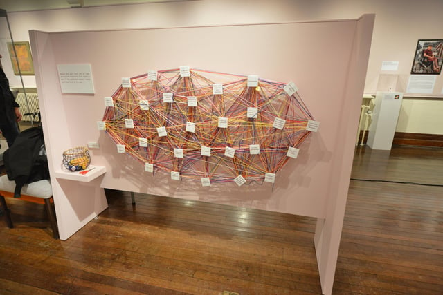 Event: Sir Tony Robinson presenting National Lottery Awards Heritage Winner Esther Fox with her award at Hastings Museum on October 20 2023. Photo showing a section of the exhibition.
