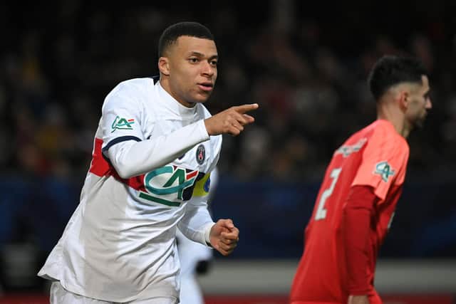 TOPSHOT - Paris Saint-Germain's French forward #07 Kylian Mbappe gestures after scoring his team's fifth goal during the French Cup football match between US Revel and Paris Saint-Germain at the Pierre-Fabre stadium in Castres, southern France, on January 7, 2024. (Photo by Valentine CHAPUIS / AFP) (Photo by VALENTINE CHAPUIS/AFP via Getty Images)