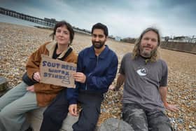 Surfers Against Sewage Paddle-Out protest in Hastings on May 18 2024.