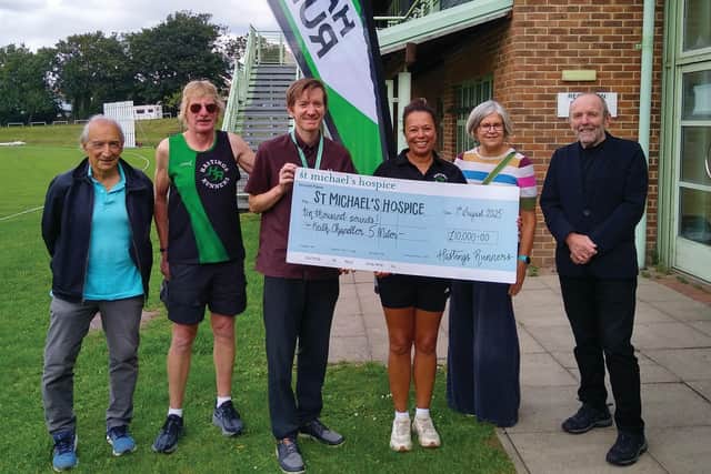 Hastings Runners present a cheque for £10,000 to St Michael’s Hospice. Left to right: Tony Demarco, Nick Webb, Anthony Mannion, Natasha Slow, Sue Mann and Michael Hall